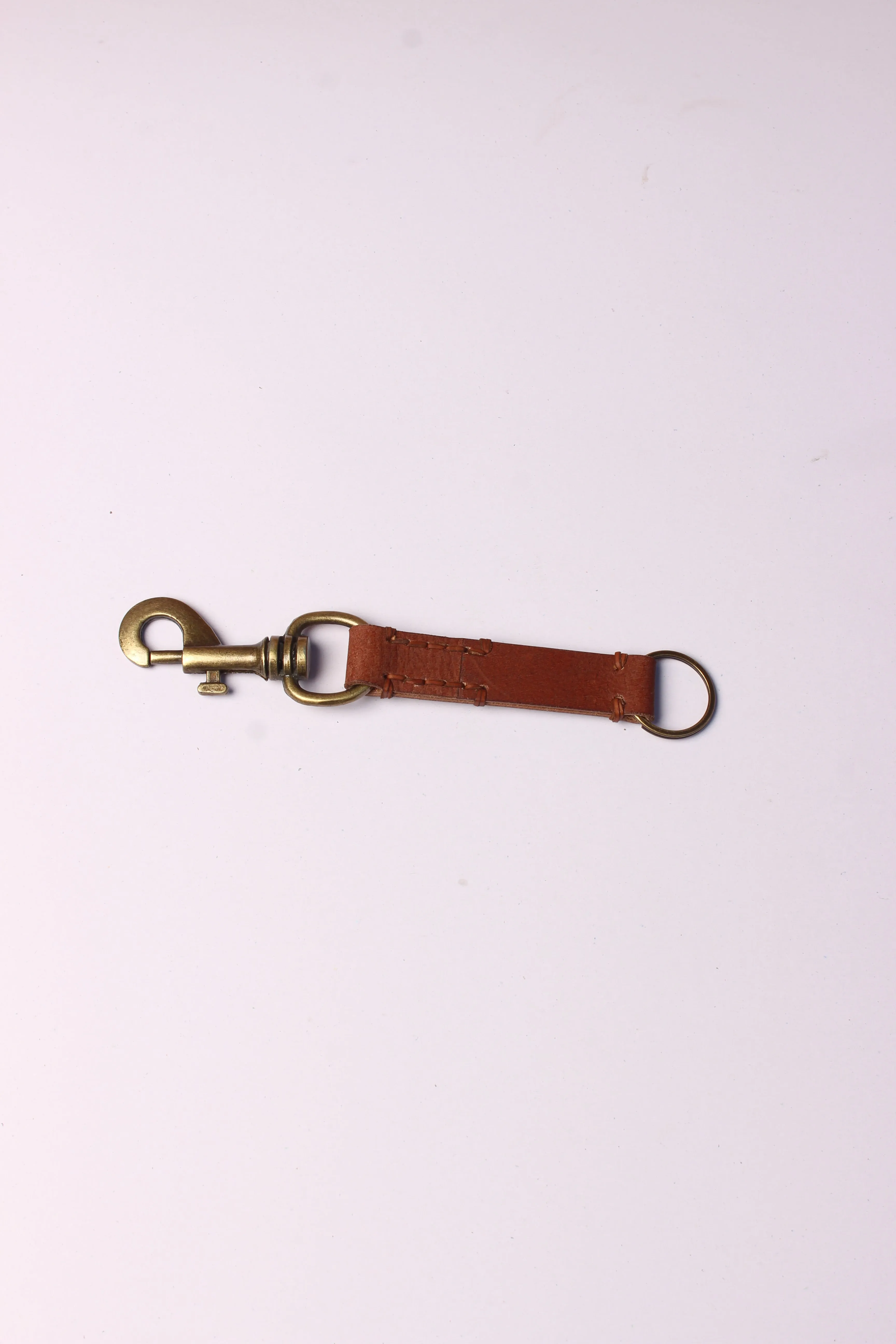 Craftsman's Touch: Genuine Leather Keyring with Elegant Side Stitching