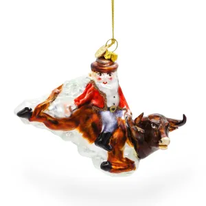 Daring Santa Riding A Bull On The Rodeo - Blown Glass Christmas Ornament