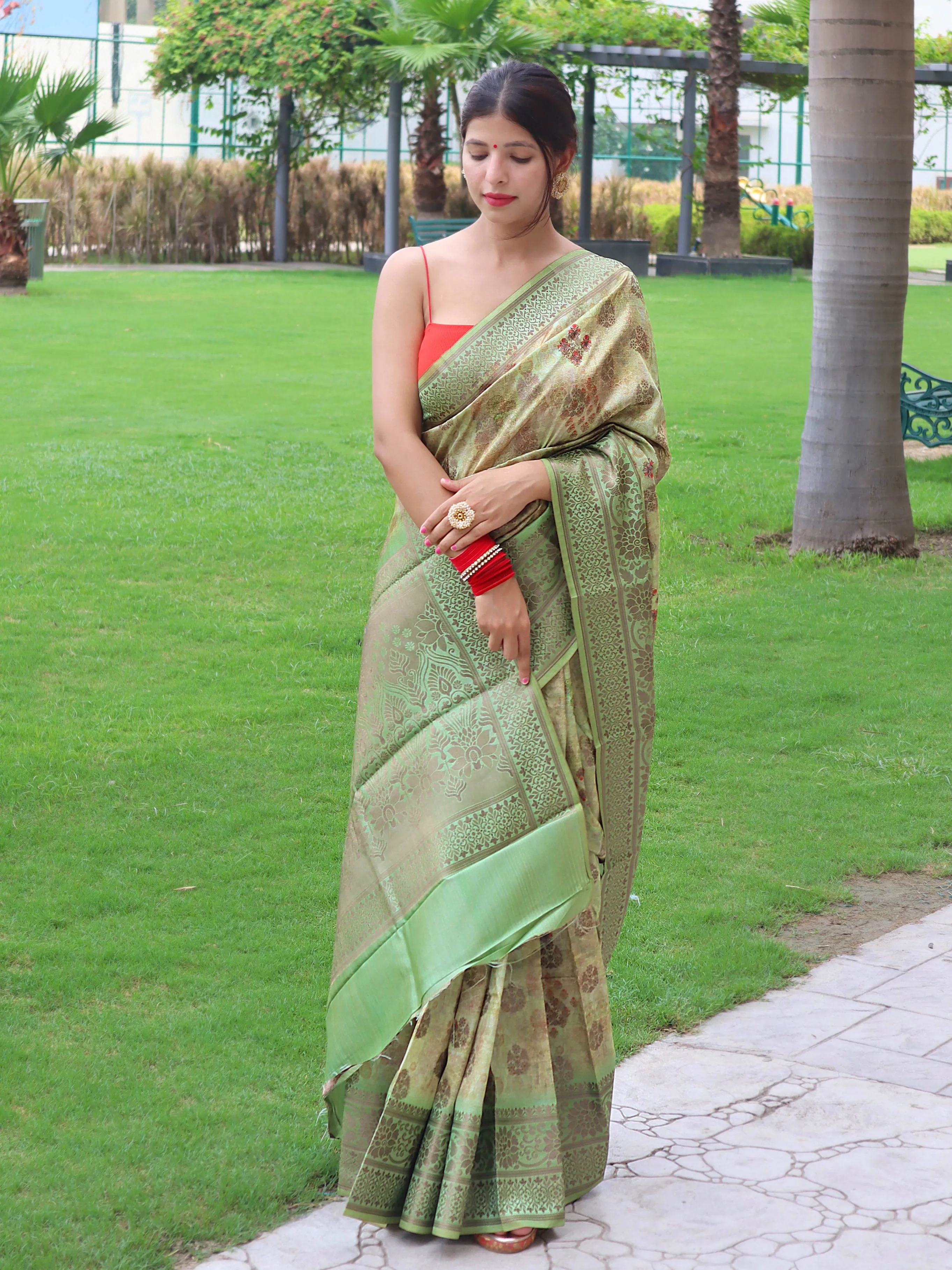 Laurel Green Saree in Banarasi Silk Woven with Floral Prints